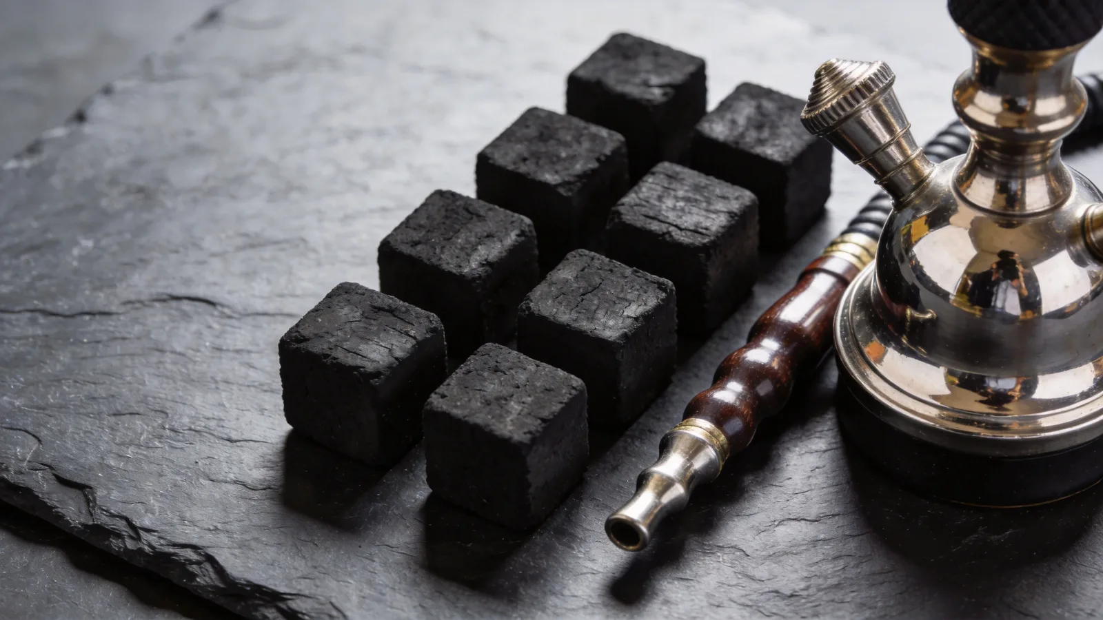 Bamboo charcoal cube blocks beside a hookah — conceptual illustration